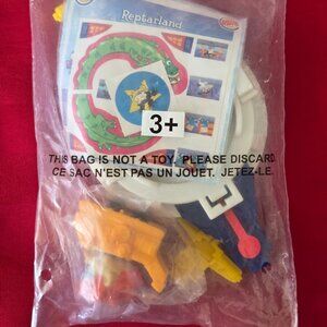 2000, RUG RATS, REPTARLAND TOY, MINT IN THE PACKAGE!!!